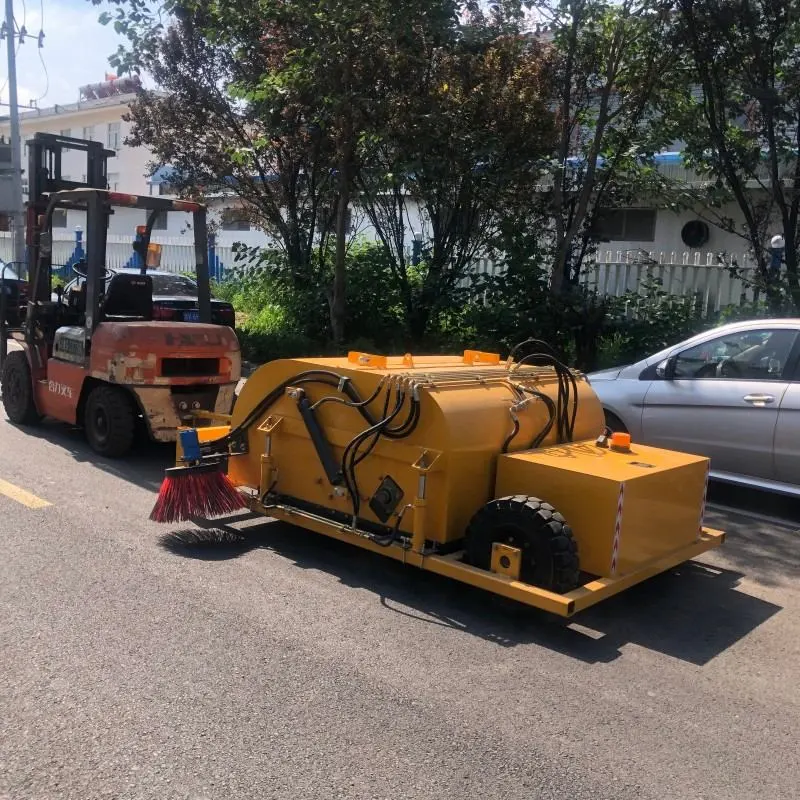 Towed trailer sweeper side view